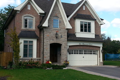 Example of a classic exterior home design in Toronto