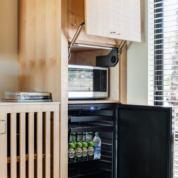 Hidden Appliances in Custom White Rift Oak Cabinetry