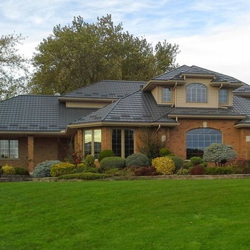 Houses with Hy-Grade's permanent steel roofing "cure"