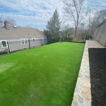Synthetic grass was installed on the upper layer for durability and easy mainten
