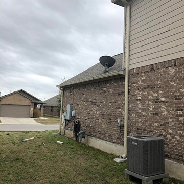 Buda, TX Seamless Gutter Install, Beige Split Level Home