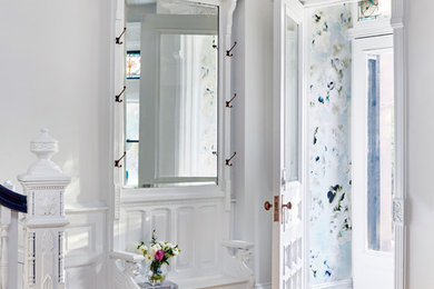 Mid-sized transitional marble floor and black floor double front door photo in New York with a white front door