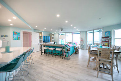 Example of an island style dining room design in Other