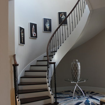 Curved Red Oak Stair with Single Basket & Twist Iron Balusters
