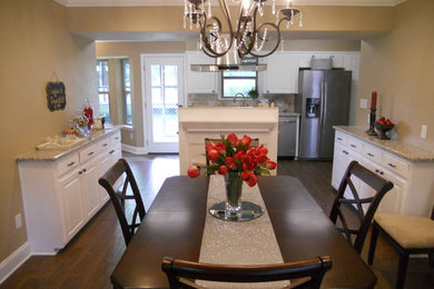 Example of a cottage chic dining room design in New Orleans