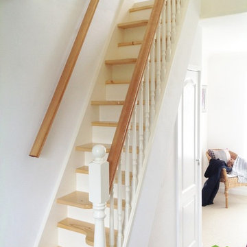 White painted SpaceSaver staircase with pine accents