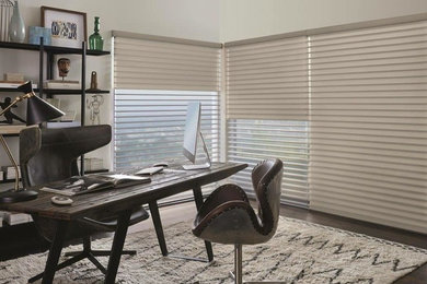 Example of a trendy home office design in Chicago