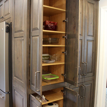 Rustic Alder Cabinets with Apron Front Farm Sink and Dekton Trillum Island