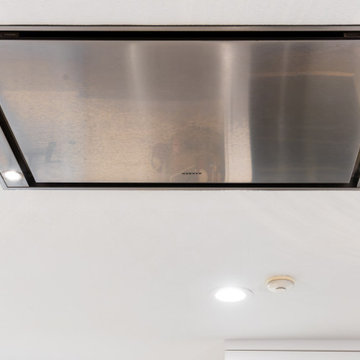 Faber Vent Hood Overlooking Kitchen Island