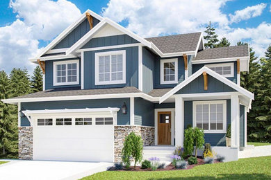 Example of a mid-sized arts and crafts blue two-story concrete fiberboard exterior home design in Minneapolis with a shingle roof
