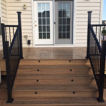Timbertech legacy deck with aluminum rails with lighted post caps.