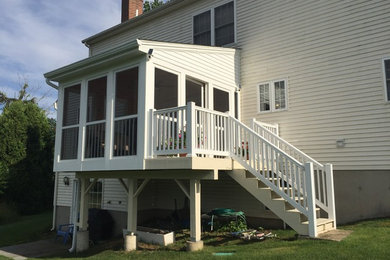 Inspiration for a mid-sized timeless painted wood floor sunroom remodel in Bridgeport with a standard ceiling