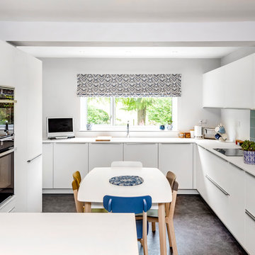 Bright white family kitchen with a touch of blue