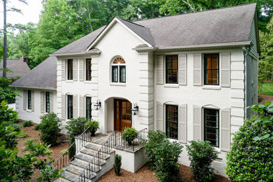 Example of a transitional home design design in Charlotte