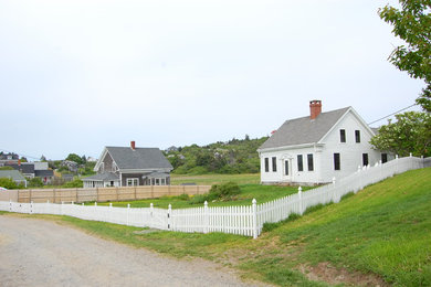 Photo of a large traditional front yard landscaping in Portland Maine.