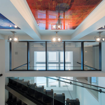 Georgina Avenue Santa Monica modern home open volume interior topped with a cust
