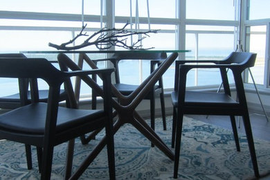 Inspiration for a small contemporary light wood floor kitchen/dining room combo remodel in Toronto with beige walls