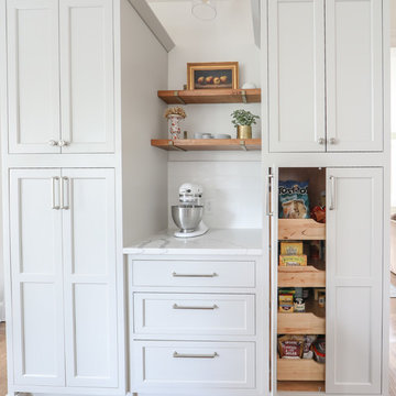 Pantry with Floating Shelves and Landing Space
