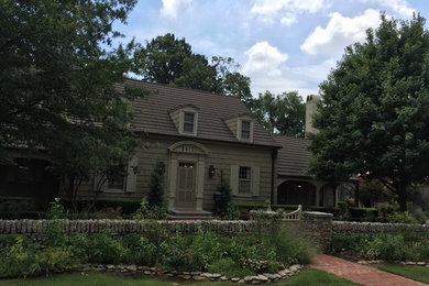 House exterior idea in Other with a shingle roof