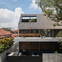 This House's Massive Roof Ensures Privacy While Letting in Light