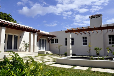 Inspiration for a mediterranean exterior home remodel in Miami
