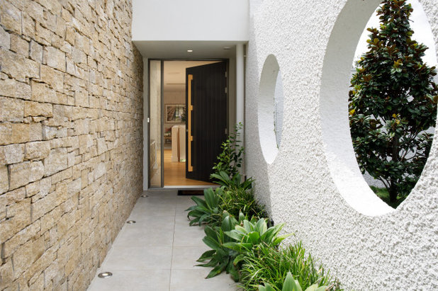 Midcentury Entry by Meraki Home Design