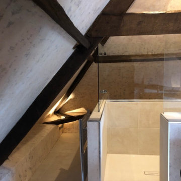 A distressed and beautiful shower in an attic
