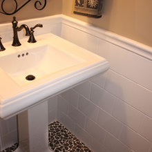 powder room - subway tiles up walls