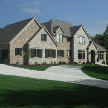 Khaki Brown Lap Siding | Pebblestone Clay Aluminum Soffit & Fascia | Ladue, MO.