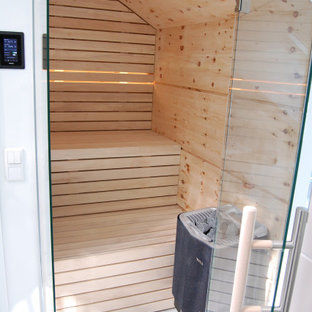 Idee per una piccola palestra multiuso nordica con soffitto in legno
