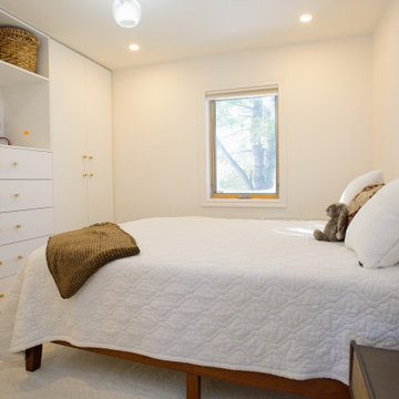 Bedroom with Built-In Wardrobes and Soft Neutral Layers | East York