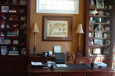 Photo of a transitional home office in Charlotte.