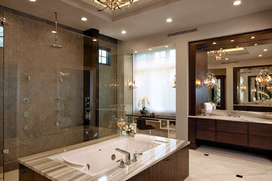 Large transitional master gray tile and mosaic tile marble floor and beige floor bathroom photo in Orlando with flat-panel cabinets, dark wood cabinets, a two-piece toilet, beige walls, an undermount sink, marble countertops and a hinged shower door