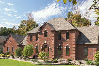 Brick exterior home photo in Kansas City
