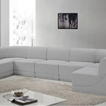 Meridian Furniture - Ollie Black Boucle Fabric U-Shaped Modular Sectional, Grey, 7-Piece: 5 Armless Chair, 2 Corner Chair - The Ollie Boucle Fabric Sectional is a truly stunning piece that boasts an elegant and attention-grabbing design. It is upholstered in a rich grey boucle fabric that feels soft and smooth to the touch, making it the perfect addition to any space that requires a touch of sophistication and style. The sectional's modular design ensures that it can easily fit into any room layout, while its plush cushioning provides optimum comfort for you and your guests. Whether you're entertaining guests or simply relaxing after a long day, the Ollie sectional is the perfect piece to help you unwind in style.