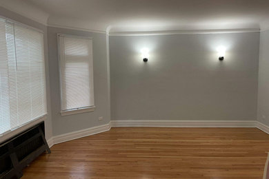Hardwood floor installation and wall and trim painting