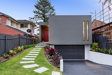 Photo of a contemporary home design in Melbourne.