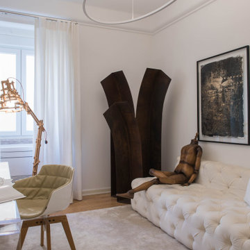 Home Office with Acrylic Desk and Corten Sculpture in Lisbon