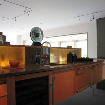 Contemporary kitchen on Philadelphia's Main Line in bird's eye maple