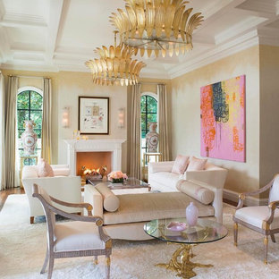 Mediterranean formal living room in Dallas with beige walls, dark hardwood flooring, a standard fireplace and no tv.