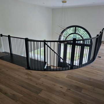 Project #130 | Curved Staircase with Wraparound Balcony