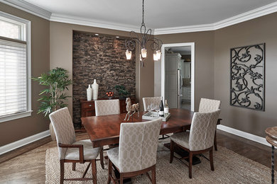 Example of an eclectic dining room design in Milwaukee