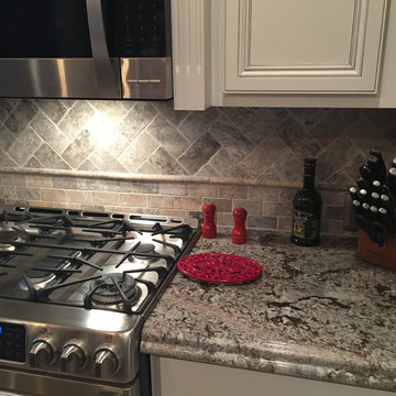 3cm Ogee Bullnose Countertop with Silver travertine tumbled backsplash