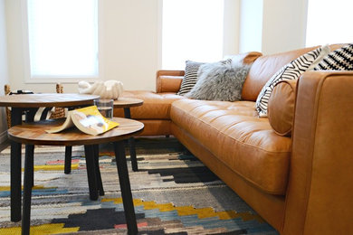 Mid-sized danish open concept dark wood floor and brown floor living room photo in Calgary with white walls