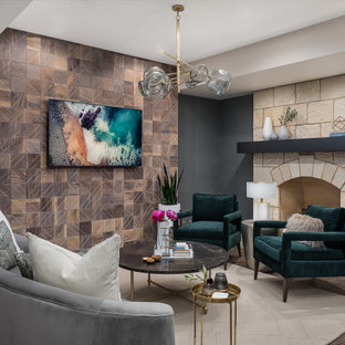 シカゴの大きいトランジショナルスタイルのおしゃれな地下室 (全地下、グレーの壁、クッションフロア、標準型暖炉、石材の暖炉まわり、茶色い床) の写真