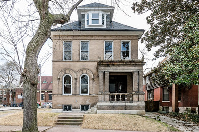 Mid-sized craftsman beige three-story brick house exterior idea in St Louis