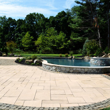 Custom Pools & Spas, Outdoor Kitchens, Patios & Walkways, and Plantings