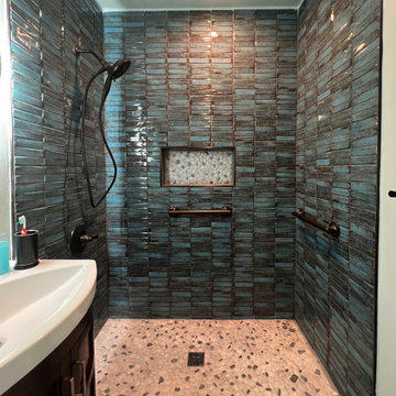 Laguna Hills Shower Remodel with Textured Tile and River Rock Pan