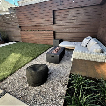 Architectural fence with built-in lights and planters