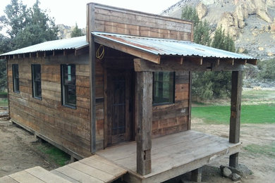 Inspiration for a rustic home bar remodel in Other